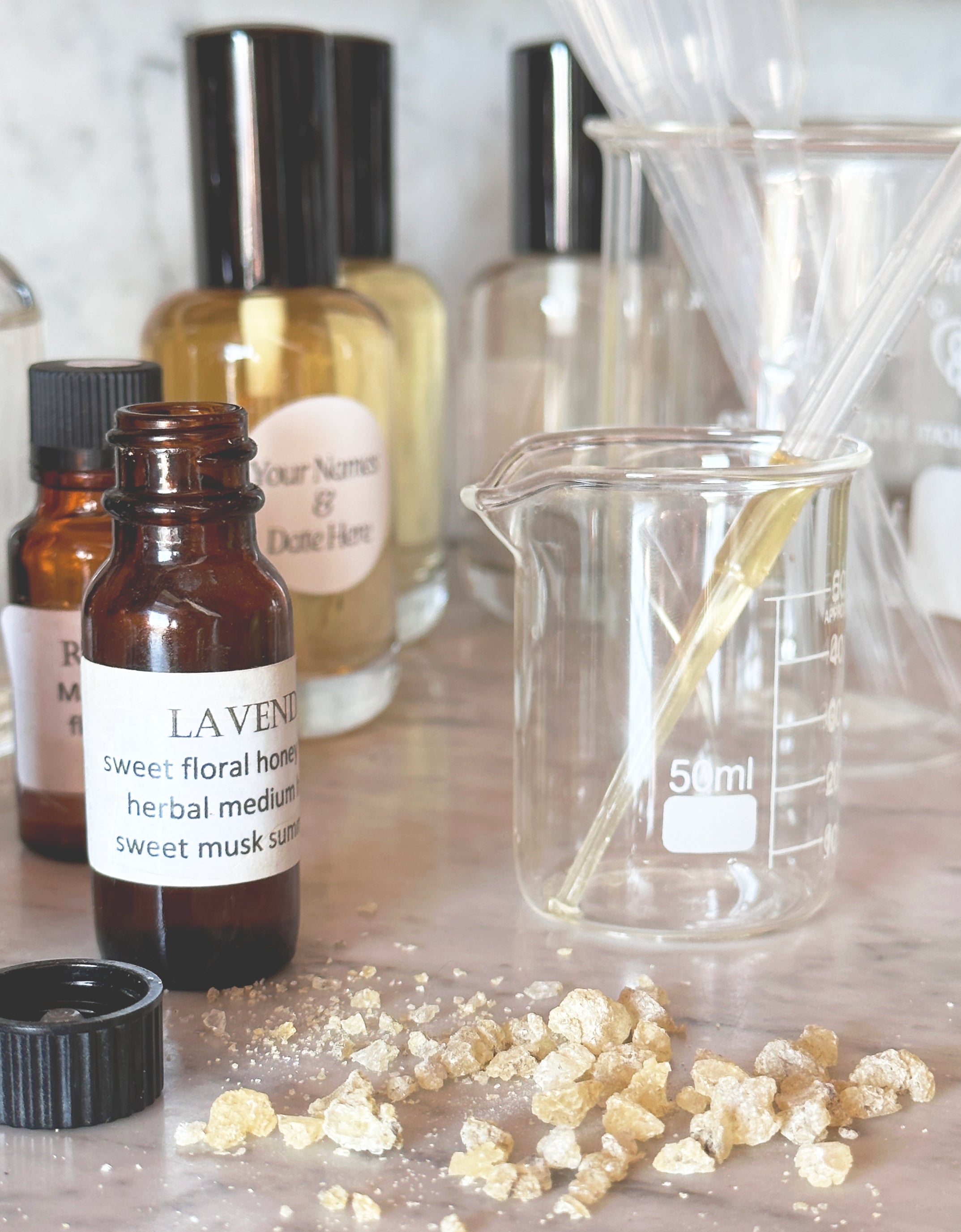 perfume apothecary lab with beaker and frankincense
