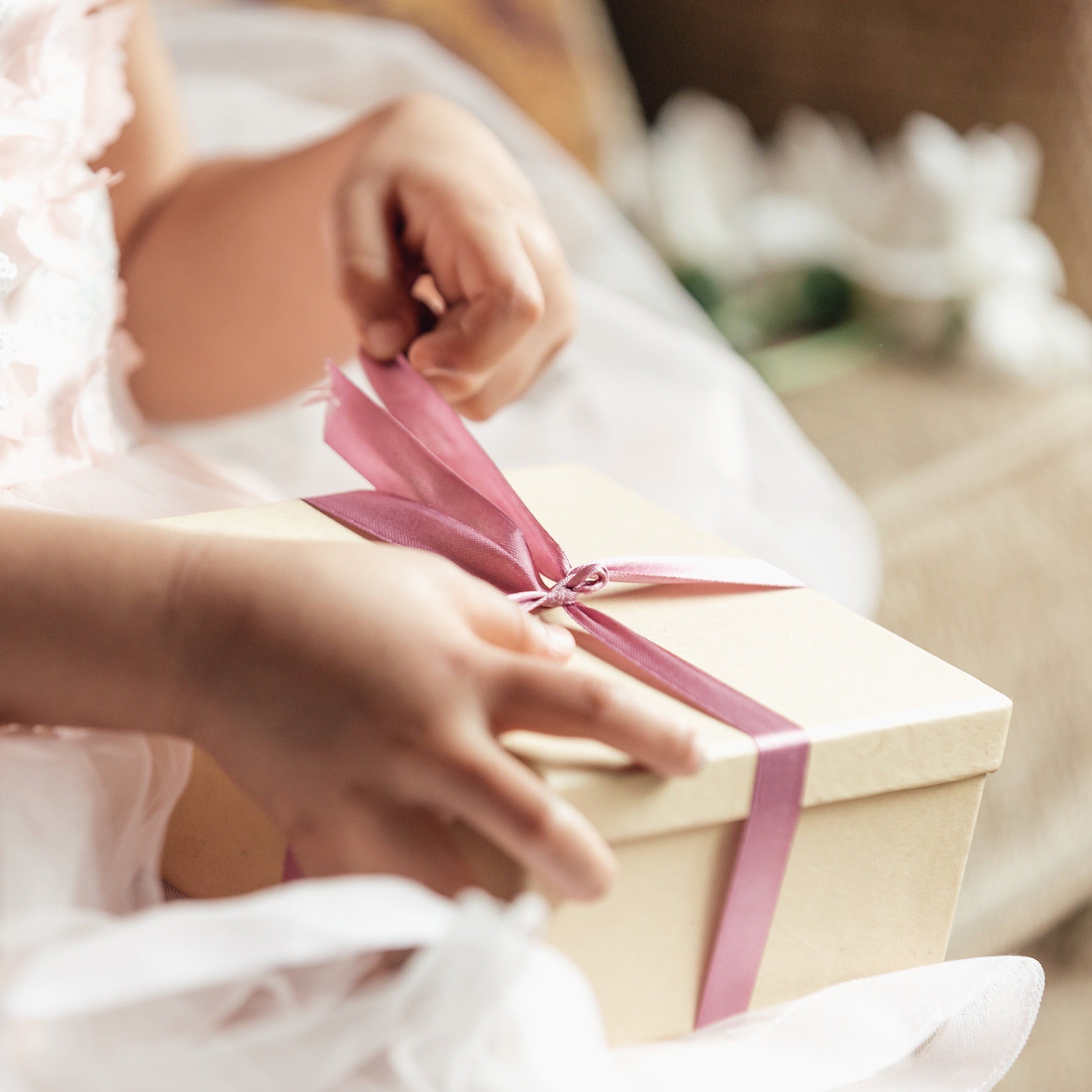 young-girl-opening-gift.jpg